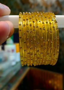 Elegant Yellow Bangles with Sparkling Embellishmen