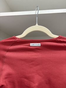Subtitled Workout Top