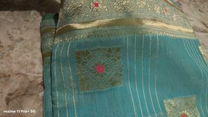Beautiful Teal Saree with Gold Border