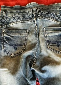 Distressed Blue Denim Jeans