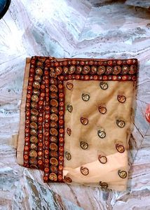 Elegant Beige Embroidered Saree
