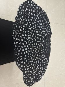 Black &amp; White Patterned Peplum Top with Solid