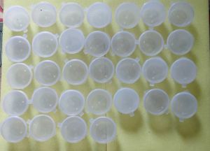 32 Small Plastic Containers with Lids