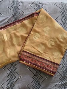 Elegant Golden Saree with Brocade Border
