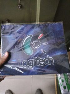 Logitech Mouse Pad , green pen and marker