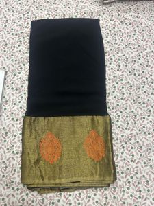 Elegant Black Saree with Gold Border