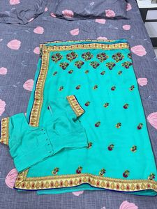 Elegant Teal Embroidered Saree
