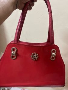 Red Handbag with Embellishments
