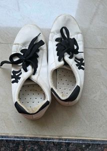 Classic White Sneakers with Black Accents