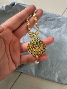 Stunning Gold Necklace with Green Stones