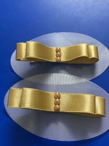 Ribbon How Hair Clip In Golden Colour