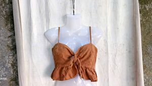 I. Brown Tie-Front Peplum Top