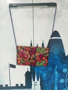 Embroidered Sling Bag.