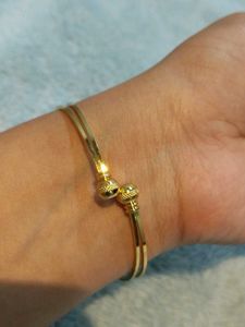 Elegant Gold Tone Bangle Bracelet with CZ Stones