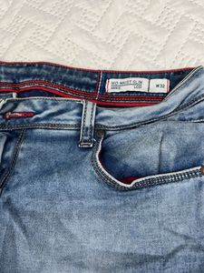 Light Wash Distressed Denim Jeans