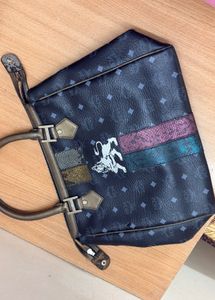 MCM Monogram Lion Detailed Handbag