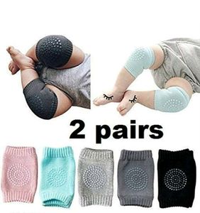 "Multicolor Baby Knee Pads for Crawling - Soft and Protective Knee Elbow Pads and Socks Set (2 Pairs) for Curious Crawlers" 👶🧦🌈