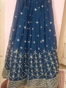 Stunning Teal lengha choli with Silver Embellishme