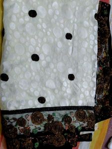 off-white polka dots saree with black border
