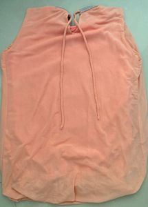 Chic Peach Blouse with Embellished Neckline