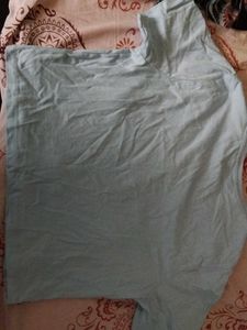Light Blue T-Shirt with Flower Embellishments