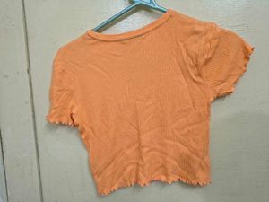 Orange Ribbed Cut-Out Cropped Top