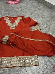 Red Embellished Kurta Set with Matching Potli Bag