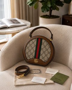 Gucci Round GG Supreme Bag