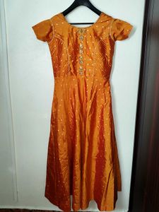 Elegant and traditional floor-length dress.