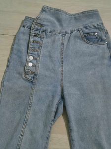 Light Wash Flared Jeans with Button Detail