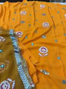 Vibrant orange unstitched suit  Embroidered Saree