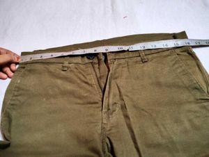 olive green or subtle brown shade pant of 32 size