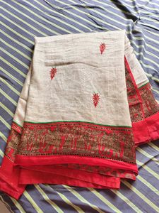 Vibrant Red Saree with Intricate Gold Print