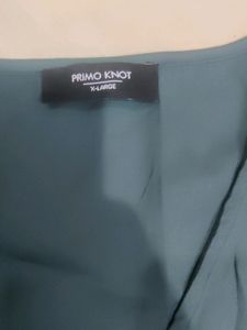 It's a Primo Knot Brand Shirt Style Top