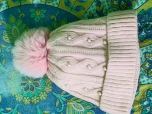 pink knitted winter beanie hat