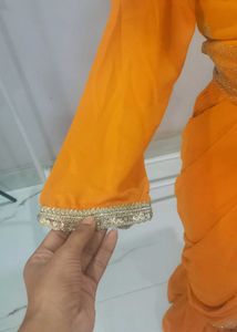 Elegant Orange Saree with Embellishments