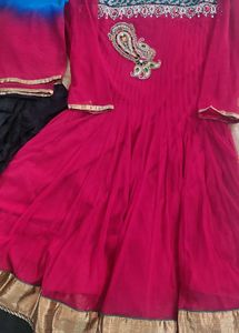 red suit with  black churidar and dupatta
