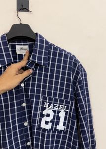 Checked Shirt with "HAZEL 21" Graphic