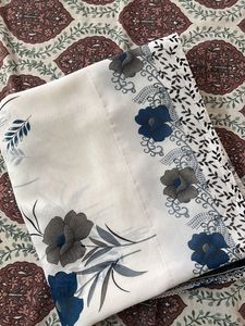 Elegant White Saree with Floral Print