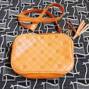 Orange Quilted Crossbody Bag