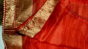 Elegant Red organza zari bordered Saree