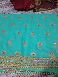 Stunning Teal Embellished Saree