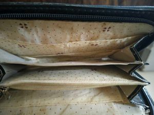 old style zip around clutch from zara