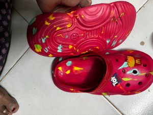 kids Orange Crocs with Green Splatter