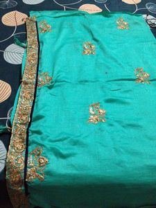 Elegant Teal Saree with Gold Embroidery
