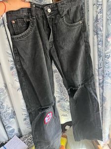 Distressed Black Jeans with Patches