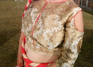 Golden Blouse With Red&amp;Mixed Orange Printed Lehnga