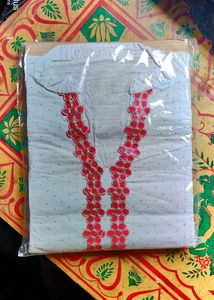 Pink and white kurta set with