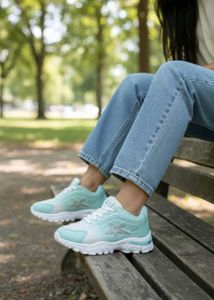Stylish Mint Green Sneakers with Star Detail