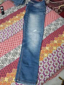 Distressed Blue Jeans
